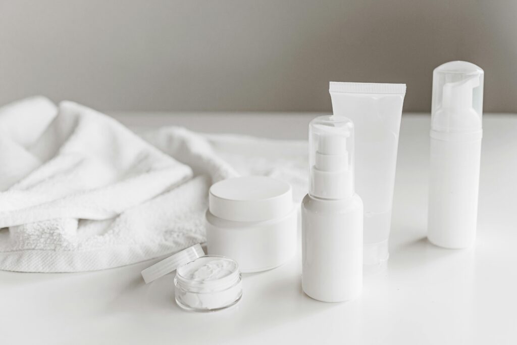 Bí Quyết Sở Hữu Làn Da "Glass Skin" Vạn Người Mê Cùng Mỹ Phẩm Luneria Clean and stylish display of skincare products on a white surface with a towel backdrop.